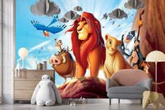 the lion king wall mural in a child's room with an animal scene behind it