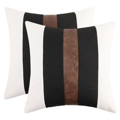 two black and white pillows with brown stripes on them, one is made from fabric