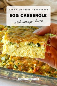 egg casserole with cottage cheese is being held up in front of the camera