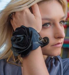 Leather Rose Cuff from Delicious Boutique Diy Leather Rose, Leather Cuff Diy, Leather Cuff Bracelet Diy, Inuit Clothing, Cuff Bracelets Diy, Leather Wrist Cuff, Leather Jewelry Making, Diy Leather Bracelet, Leather Embroidery