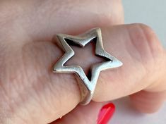 A star ring for star children :) . Unisex silver star ring, simple and modern. Contemporary sky themed jewelry for women and men. Silver plated zamak One size, adjustable Nickel and lead free Every item at Dharma Jewelry Studio will come with gift wrapping https://dharmajewelrystudio.etsy.com/listing/1375531594 Jewelry Care Brass and zamak products are gold or silver plated. Chemicals in sprays and beauty products may damage the plating. To keep your jewelry looking bright and new, avoid contact Cute Rings For Women, Cute Jewelry Silver, Star Shaped Silver Metal Jewelry, Spiritual Silver Star Jewelry, Masc Rings, Quirky Rings, Edgy Adjustable Star-shaped Jewelry, Edgy Silver Star-shaped Jewelry, Metal Rings Handmade