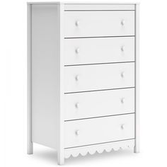 a white dresser with four drawers