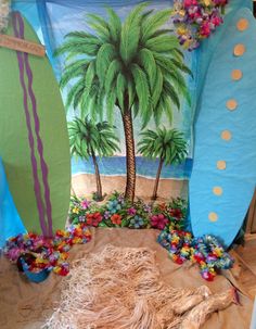 some surfboards and palm trees are on the ground in front of a wall mural