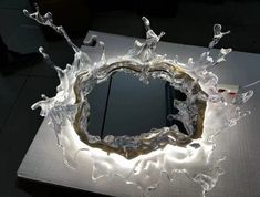 a mirror that is made out of ice and water