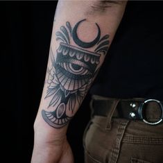 a person with a tattoo on their arm