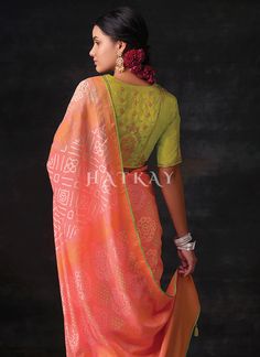 Peach And Lime Embroidered Festive Saree has classic and stylish appeal with all the hues of indian traditional touch. This saree is embedded perfectly with bandhani motifs all over pallu on pure organza silk saree with tassel detail paired with resham thread and sequence embroidered vibrant silk blouse. Drape this saree on parties and events with heels and handcrafted jewellery to look like a diva. Shop Latest Indian Saree In USA, UK, Canada, Germany, Mauritius, Singapore With Free Shipping Wor Bandhani Saree Blouse Designs Latest, Worked Blouse, Festive Saree, Latest Indian Saree, Organza Silk Saree, Designer Sarees Collection, Blouse Saree, Embroidery Saree, Up Book