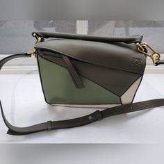 Loewe Autumn Green Light Oat Puzzle Bag In Size Small. Bought In Madrid. Limited Edition Colorway. Basically Brand New. Could Use Some Leather Conditioning. Feel Free To Reach Out With Any Questions! Loewe Puzzle Bag, Loewe Bags, Autumn Green, Loewe Puzzle, Puzzle Bag, Loewe Bag, Green Light, Small Bags, Oats