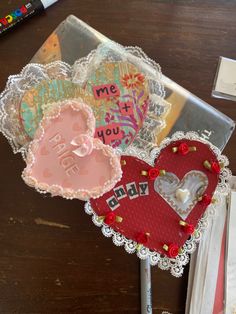 valentine's day decorations are displayed on a table