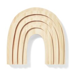 a wooden arch shaped like a rainbow