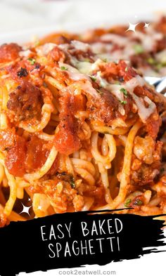 a close up of spaghetti on a plate with the words easy baked spaghetti