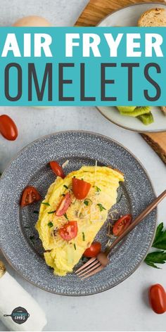 an omelet on a plate with tomatoes and parmesan cheese in the background