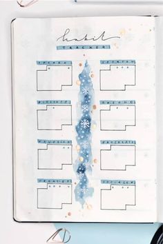 an open planner with the words best written on it and snowflakes around it