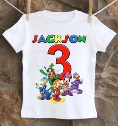 An fun, playful Mickey and the Roadster Racers birthday shirt personalized with your child's name and age. All shirts are 100% cotton. I use a professional heat press to transfer the image, NOT a home iron. I will personalize it with your child's name and age for no addition cost. I use high quality shirts from ARB Blanks. These are very soft shirts, not thin undershirts. Please see the size chart below for the t-shirts and choose your options in the drop down menus. *Please note heat pressed shirts may become distressed through wash/wear. Always wash them inside out on a delicate cycle using mild detergent and no bleach. Roadster Racers Birthday, Mickey And The Roadster Racers, Heat Press Shirts, Birthday Shirt, Kid Names, Birthday Shirts, Heat Press, Gender Neutral, Inside Out