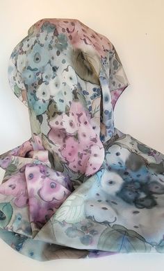 Hand painted silk stole with large flowers Handmade artisanal gift. This scarf can be worn in any season according to needs and occasions. A floral composition of parma, pink, purple, pale pink irises on a very soft background Luxurious silk scarf. Unique gift for mom, grandmother gift, sister gift, friend Floral silk scarf/Floral silk shawl/Designer scarf/ Unique handmade scarf. Christmas gift idea for women. * 100% silk crepe de chine * hand rolled with silk thread * 185 x 43 cm * Iris floral Scarf Flower, Soft Background, Silk Stoles, Fashion Shops, Hand Painted Scarves, Painted Scarf, Floral Silk Scarf, Unique Gifts For Mom, Flower Scarf