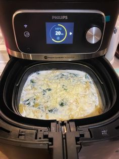 a casserole is being cooked in an air fryer