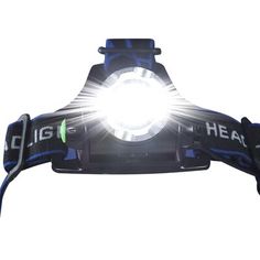 the headlamp is lit up with bright light on it's headband