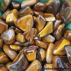 some very pretty looking rocks in a green container