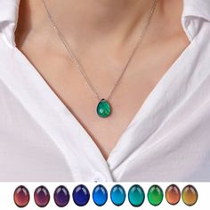 This beautiful color changing mood necklace will really stand out! Based on the mood ring created in the mid 1970's, this lovely teardrop shaped necklace is a creative modern take. Made with a thermochromic stone and stainless steel, this pendant will work best when worn against the bare skin as it senses temperature fluctuations and responds accordingly with the correct color! Also available in a lovely sphere and cylinder style! Mood Necklace, Mood Stone, Mood Jewelry, Real Flower Jewelry, Stainless Steel Chain Necklace, Mood Ring, Crystal Bangle, Gemstone Beaded Bracelets, Water Drop