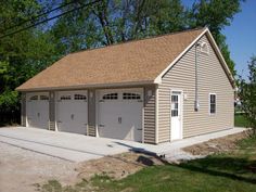 two car garage with one attached to the side