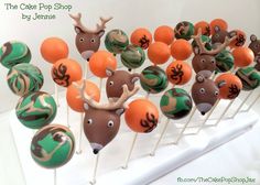 cake pops decorated with deer heads and orange balls