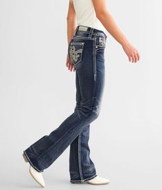 Rock Revival Jordyn Easy Boot Stretch Jean - Blue 32/32, Women's Jordyne202 Mid-rise Curvy fit eased through the hip and thigh 17 1/2 bottom opening Comfort waistband Rhinestones on metallic embroidered back pockets Destruction details. This quality denim is hand-finished for a unique look. It will wear like your favorite jeans, with each hole and tear continuing to destruct over time. You will love the comfort of this denim that has the look and feel of years of wear. . 99% Cotton 1% Elastane. Rock Revival Jeans Outfit, Rock Revival Jeans Women, Country Jeans, Jean Fits, Super Flare Jeans, Womens Jeans Bootcut, Rock Revival Jeans, Jeans Bootcut, Womens Jeans