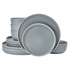 a stack of blue dishes on top of each other