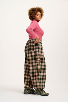 Rumi Are Our Comfortable Cargo Trousers With A Balloon Shape Leg, And An Elasticated Waist & Cuff. Available Here In Annie Tartan! Our Fit Fully Elasticated Waistband To Sit On The Waist Oversized Balloon Shaped Full Length Leg With Roomy Hips And Elasticated Cuff At Hem Deep Side Pockets, Cargo Style Pockets At The Knee And One Back Patch Pocket The Fabric 100% Organic Brushed Cotton - Made From Gots Certified Organic Cotton Yak Care Machine Washable Cool Iron On Reverse Modelled By Ocean, Uk 1 Lucy Yak, Lucy And Yak, Dungarees Shorts, Cotton Trousers, Skirt Jumpsuit, Cargo Style, Cargo Trousers, Brushed Cotton, Tee Dress