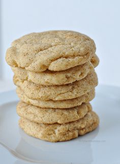 a stack of cookies sitting on top of a white plate