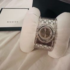 Limited Edition! Rare New Ladies Gucci Wide Twirl 2.60ct.Aprx. Custome Set Real Diamond Watch Ya112401 Limited Edition With Diamonds All On Band And Dual Dials. Hard To Find. New Never Been Worn. New Ladies Gucci Wide Twirl 2.60ct.Aprx. Custome Set Real Diamond Watch Ya112401 You Are Watching A New Ladies Gucci Wide Twirl 2.60ct.Aprx. Custome Set Real Diamond Watch Ya112401 *Product Information* Brand Name:Gucci Model Number:Ya112401 Part Number:Ya112401 Item Shape: Round Dial Window Material Ty Gucci Diamond Watch With Diamond Hour Markers, Luxury Gucci Diamond Watch, Elegant Gucci Diamond Watch In White Gold, Gucci White Gold Elegant Diamond Watch, Elegant Gucci White Gold Diamond Watch, Timeless Silver Gucci Diamond Watch, Gucci Silver Diamond Watch For Formal Occasions, Gucci Silver Diamond Watch, Elegant Silver Gucci Diamond Watch