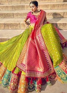 About Lehenga: This green-color Banarasi silk lehenga choli is carefully crafted. This lehenga choli is Designed all over using thread, embroidered, and sequins work. Available with a similarly embroidered silk choli and silk woven dupatta, embellished in a similar work border. All Of This Accenting The Feminine Beauty. This lehenga choli is perfect for weddings, engagements, parties, and functions. • Occasion: Party, Traditional, engagement, Festival, Function• Lehenga Fabric: Banarasi silk• Bl Anarkali Ideas, Garara Suit, Saree Bridesmaid, Stylish Lehenga, Saree South Indian, South Indian Saree, Orang India, Latest Lehenga Designs, Modern Indian Wedding