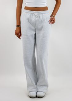 Stay cozy and stylish with these straight leg sweatpants! Featuring a relaxed straight-leg design with convenient pockets and a drawstring waist, these sweatpants are perfect for lounging or running errands. The soft fabric ensures all-day comfort, while the versatile grey hue makes them easy to style with your favorite casual tops. The Details Pockets Drawstring Waist Straight Leg 50% Cotton, 50% Polyester [#other] Machine Wash Cold with Like Colors Tumble Dry Low for 5 Minutes, Then Hang to Dr Matching Sweat Set, Going Out Skirts, Straight Leg Sweatpants, Sweatpants Grey, Autumn Sun, Pumpkin Patch Outfit, Mini Skirt Dress, Lounge Outfit