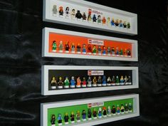 legos are lined up on the wall above each other in different colors and sizes