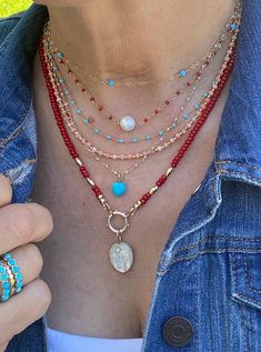 Beautiful red coral rondel beads necklace adorned with gold spacer beads and a gold charm clasp. The clasp allows you to wear one or more charms at a time or none. Length 18" Red coral has been used as a symbol of courage for decades. It’s a stone that symbolizes joy, abundance, protection, and prosperity. This stone will focus your energies on the pursuit of your goals. Root chakra -This information is intended for spiritual support only- Beads 3mm Spacer 2mm Spacer oval 6x3mm Findings 14K GF Luxury Coral Beaded Necklace With Round Beads, Red Coral Jewellery, Vintage Jewelry Repurposed, Red Beaded Necklaces, Red Coral Necklace, Coral Beads Necklace, Round Bead Necklace, 2024 Design, Repurposed Jewelry