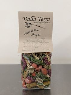 a package of pasta with vegetables and meats