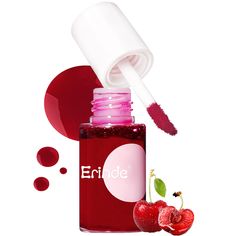 an open bottle of liquid next to two cherries on a white background with the word ende written above it