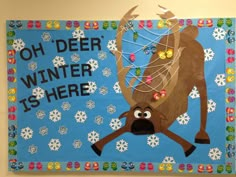 a bulletin board with an image of a deer and the words oh deer winter is here