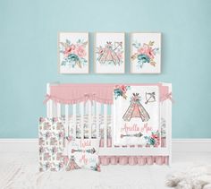 a baby's room with blue walls and pink accents