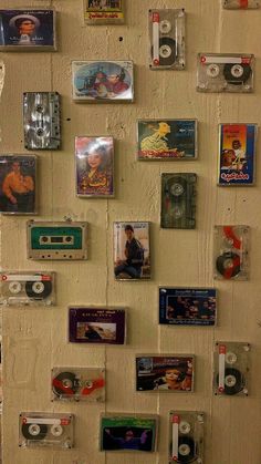 there are many cassettes on the wall