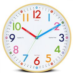 a white clock with colorful numbers on the face and hands is shown in front of a white background