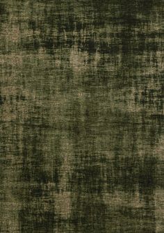 an area rug with green and brown colors