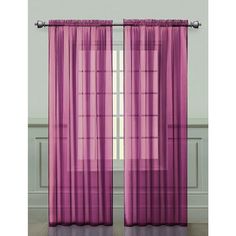 purple sheer curtains hanging in front of a window