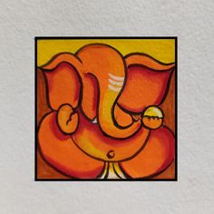 an orange and yellow painting on a white wall