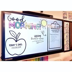 a bulletin board with writing on it and an apple next to the words good morning