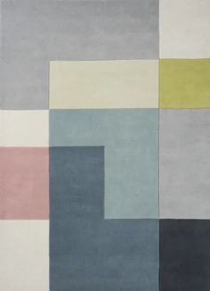 an area rug with different colored squares on it