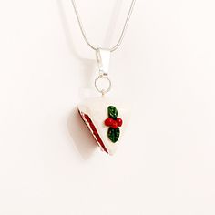 Adorable and realistic looking red velvet cake. Made out of polymer clay. We use Nickel free parts and silver plated chains in all our jewelry. Due to the item being handmade, they can be slightly different. Colors might look different in your screen. Follow us https://www.instagram.com/tinyladybugdesigns/ Red Polymer Clay Necklace For Gift, Handmade Red Clay Jewelry, Red Polymer Clay Jewelry For Gifts, Red Polymer Clay Jewelry For Gift, Handmade Polymer Clay Jewelry For Birthday, Unique Red Polymer Clay Necklace, Nickel-free Polymer Clay Necklace Gift, Nickel-free Red Jewelry For Birthdays, White Clay Jewelry As A Gift