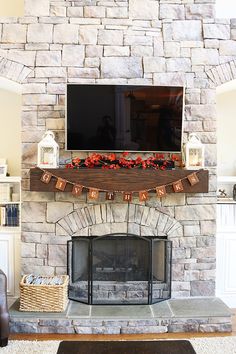 a living room with a fire place and television