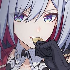 an anime character with blue hair and purple eyes is eating something out of her hand