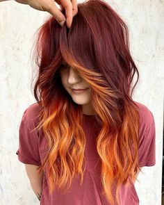 Red Hair With Different Color Bangs, Auburn And Burgundy Hair, Red And Purple Pixie Hair, Fire Hair Color Ideas, Color Bangstyle Hair, Natural Red Hair With Black Highlights, Dark Red Hair With Orange Highlights, Red Hair With Orange Money Piece, Red Hair With Colored Streaks