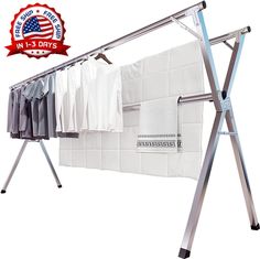 an ironing board with clothes hanging from it's sides and a red seal in the background