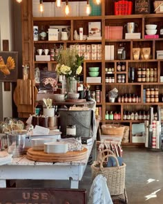 a store filled with lots of different types of items and baskets on the shelves next to each other